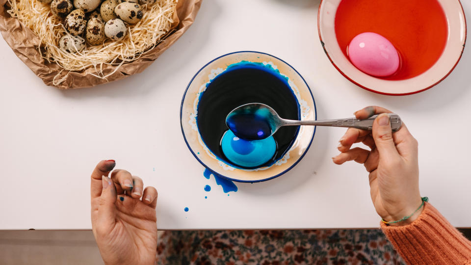 Coloring Easter eggs in different colors. Quail eggs in a nest. Easter concept Cleaning egg dye off your hands can be a hassle, but it's not an impossible task. Here are some at-home products you can use to get your skin back to normal. 