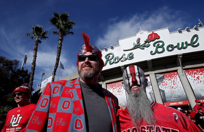 PASADENA, CALIF. - JAN. 1, 2022. Ohio State fans Todd Barhart, 49, left, and MIke Cochran.