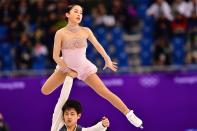 <p>Japan’s Miu Suzaki and Japan’s Ryuichi Kihara compete in the figure skating team event pair skating free skating during the Pyeongchang 2018 Winter Olympic Games at the Gangneung Ice Arena in Gangneung on February 11, 2018. / AFP PHOTO / Mladen ANTONOV </p>