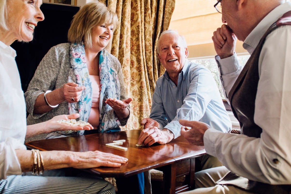 A group of senior citizens play games. 