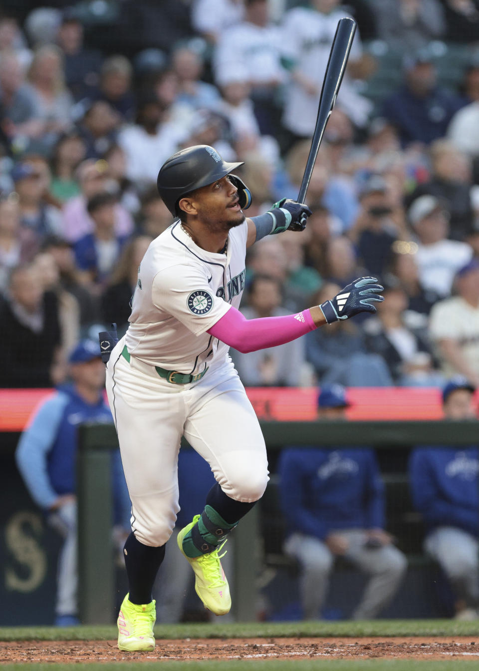 Seattle Mariners' Julio Rodríguez watches a single against the Kansas City Royals during the sixth inning of a baseball game Tuesday, May 14, 2024, in Seattle. (AP Photo/Jason Redmond)