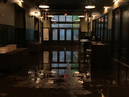 Flood water is seen inside Ace Hotel in New Orleans