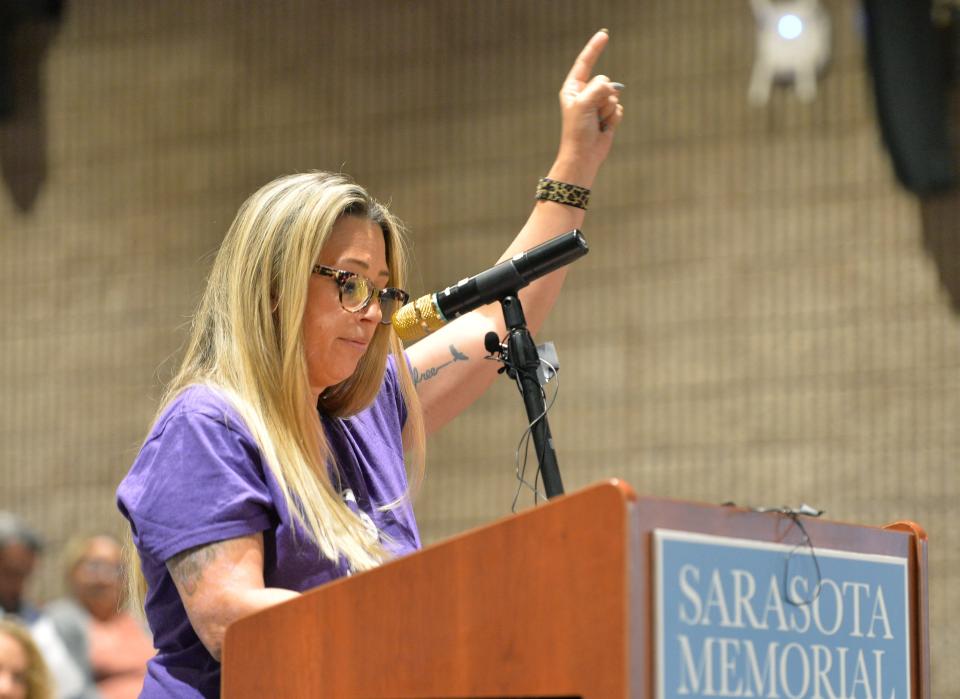 Tanya Parus with Sarasota County Moms for America, speaks during the public comment portion of the Sarasota Hospital Board meeting on Tuesday, Feb. 21, 2023. 