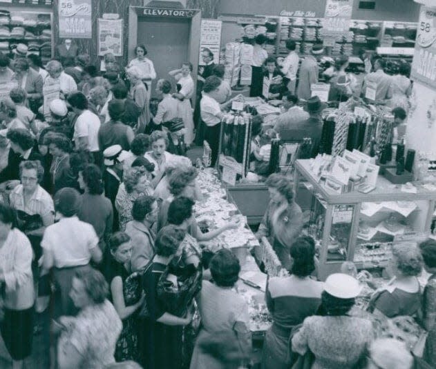 Akron shoppers crowd Hower's department store at 974 E. Market St. in Middlebury in 1957.