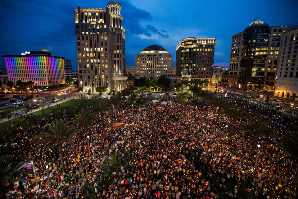 <p>Thousands gather on June 13, 2016, at the Dr. Phillips Center for the Performing Arts in Orlando to pay their respects to those lost in the Pulse nightclub shooting. (Photo: Samuel Corum/Anadolu Agency/Getty Images) </p>