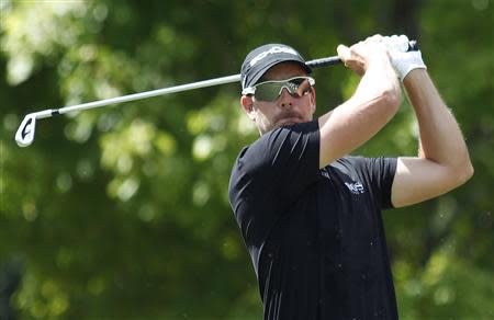 Henrik Stenson of Sweden hits off the second tee in the final round of the Tour Championship golf tournament at East Lake Golf Club in Atlanta, Georgia September 22, 2013. REUTERS/Tami Chappell (UNITED STATES - Tags: SPORT GOLF)