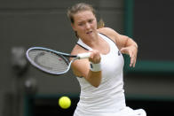 Germany's Jule Niemeier plays a return to Germany's Tatjana Maria in a women's singles quarterfinal match at the Wimbledon tennis championships in London, Tuesday July 5, 2022. (AP Photo/Kirsty Wigglesworth)