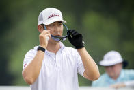 Tain Lee puts his sunglasses on before he tees off on the first hole during the third round of the Palmetto Championship golf tournament in Ridgeland, S.C., Saturday, June 12, 2021. (AP Photo/Stephen B. Morton)