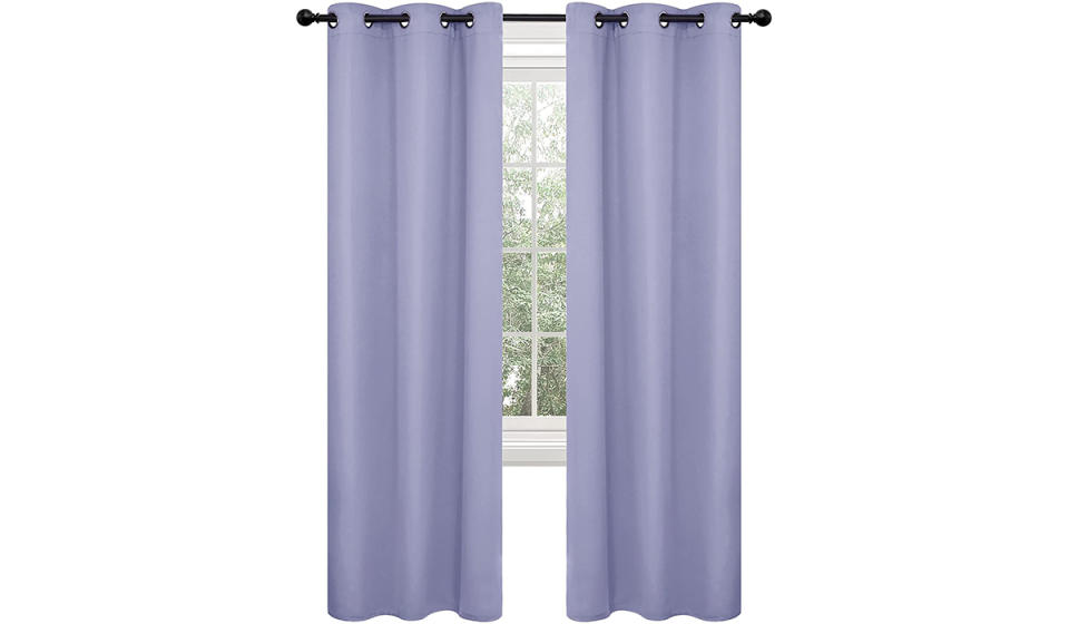 A pair of purple curtains. 