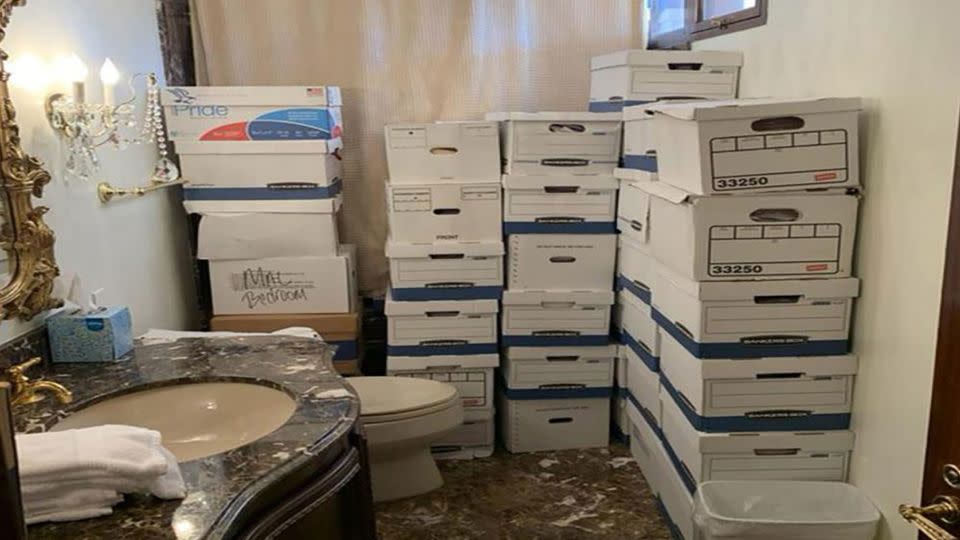 This photo from the US Justice Department shows boxes of classified documents stored in a bathroom and shower in the Mar-a-Lago Club. - US Department of Justice