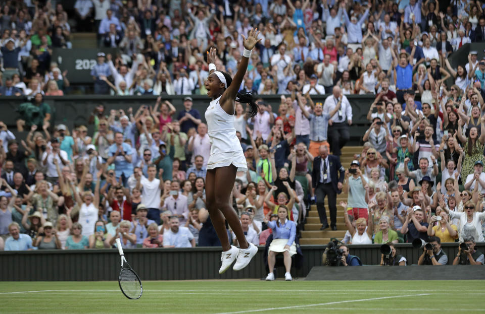 United States' Cori "Coco" Gauff celebrates after beating Slovenia's Polona Hercog in a Women's singles match during day five of the Wimbledon Tennis Championships in London, Friday, July 5, 2019. (AP Photo/Ben Curtis)