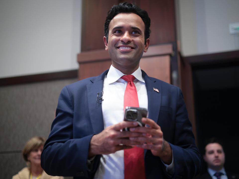 Republican presidential candidate Vivek Ramaswamy waits to take the stage at the Vision ’24 National Conservative Forum March 18, 2023