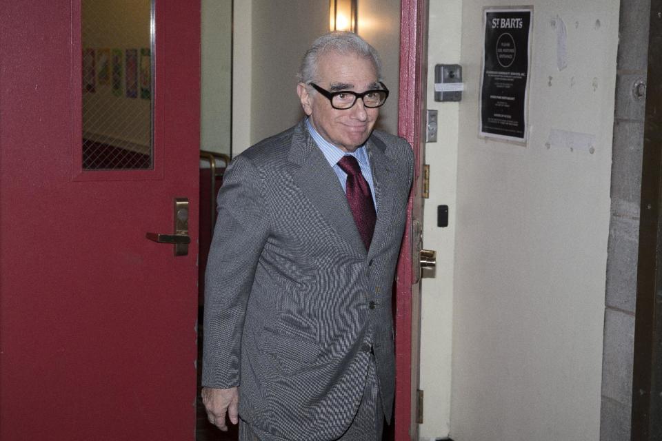 Director Martin Scorsese leaves St. Bartholomew's Church after a memorial service for fashion designer L'Wren Scott, Friday, May 2, 2014, in New York. Scott committed suicide on March 17 in her Manhattan apartment. (AP Photo/John Minchillo)