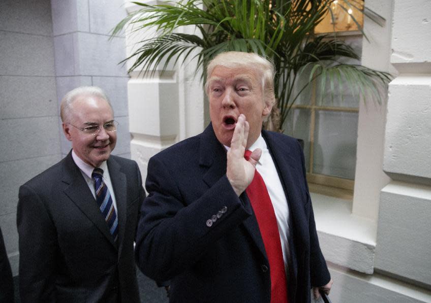 President Donald Trump and Health and Human Services Secretary Tom Price arrive on Capitol Hill in Washington, Tuesday, March 21, 2017, to rally support for the Republican health care overhaul. (AP Photo/J. Scott Applewhite)