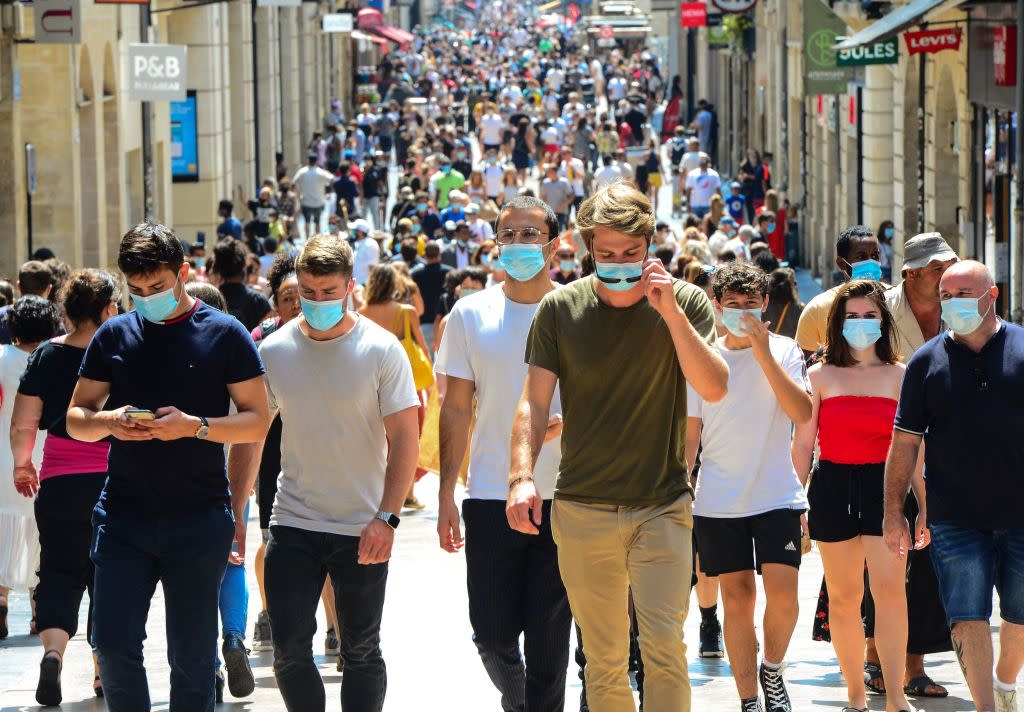 People on the street wearing face masks