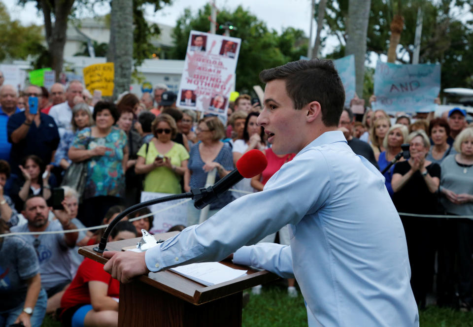 Cameron Kasky, a student at Marjory Stoneman Douglas High School, speaks to protesters at a Call To Action Against Gun Violence rally by the Interfaith Justice League and others in Delray Beach, Florida on&nbsp;Feb. 19, 2018. (Photo: Joe Skipper / Reuters)