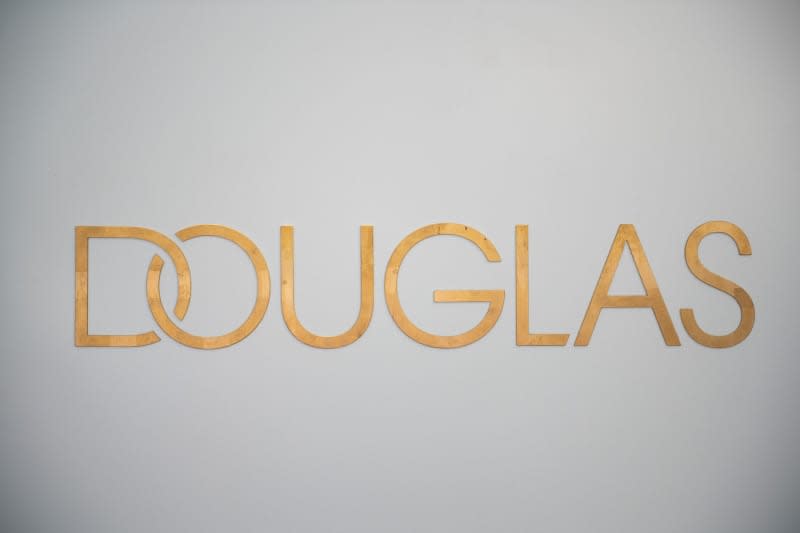 German perfume and cosmetics retail chain Douglas logo seen at a Douglas store on Jungfernstieg. Daniel Reinhardt/dpa