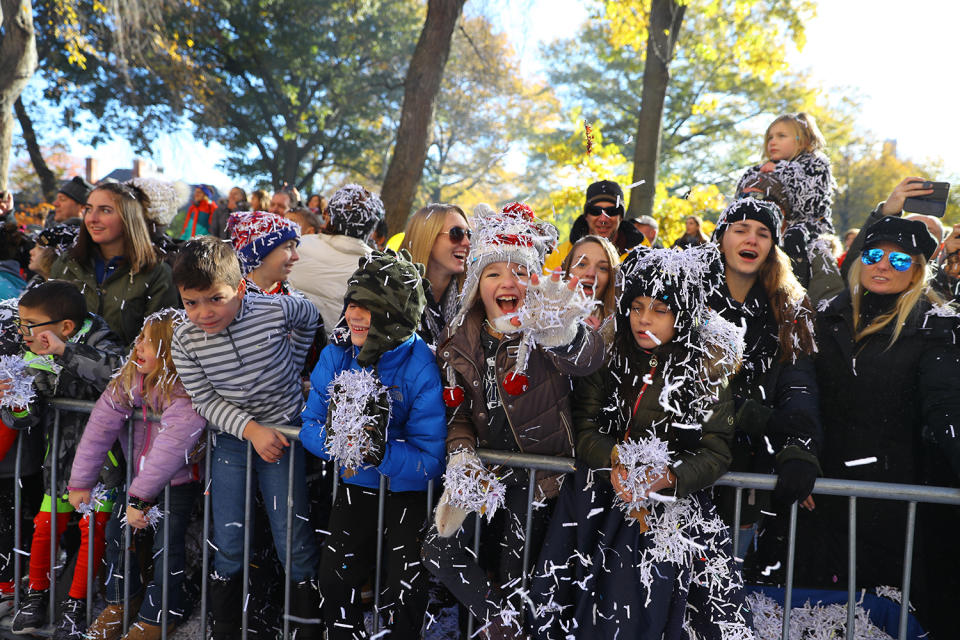 <p>Youngsters are covered in confetti thrown by clowns on Central Park West during the 91st Macy’s Thanksgiving Day Parade in New York, Nov. 23, 2017. (Photo: Gordon Donovan/Yahoo News) </p>