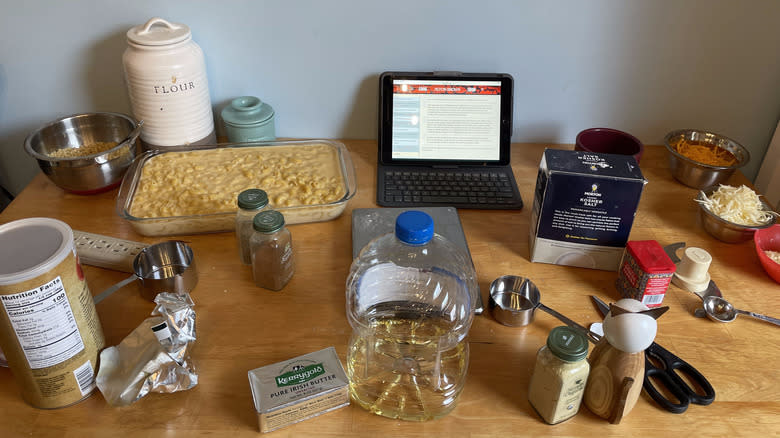 tray of mac and cheese, iPad, and ingredients