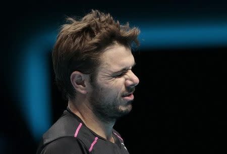 Tennis - Barclays ATP World Tour Finals - O2 Arena, London - 21/11/15 Men's Singles - Switzerland's Stanislas Wawrinka reacts during his semi final match with Switzerland's Roger Federer Reuters / Suzanne Plunkett Livepic