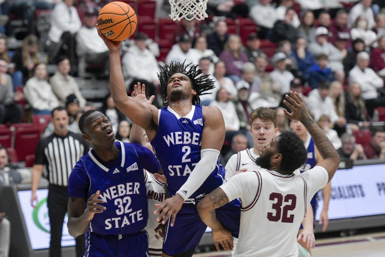 MISSOULA, MONTANA - January 22 Dillon Jones #2 of the Weber State Wildcats shoots the ball during the second half of a game against the Montana Grizzlies at Robin Selvig Court inside Dahlberg Arena on January 22, 2024 in Missoula, Montana. (Photo by Tanner Ecker/University of Montana/Getty Images)