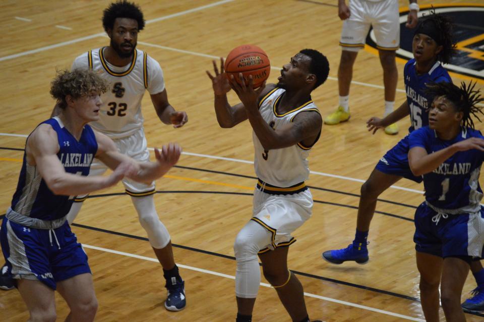 St. Clair County Community College's Kelvin Balfour drives to the basket during a game earlier this season. He's currently averaging 13.9 points per game.