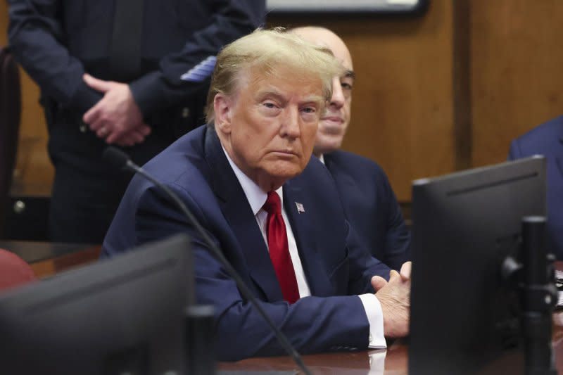 Former U.S. President Donald Trump appears Thursday in New York during a court hearing on charges of falsifying business records to cover up a hush money payment to an adult film star. Pool Photo by Brendan McDermid/UPI