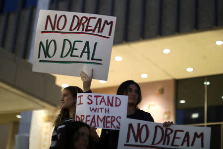 People protest to call for a new DREAM Act to replace DACA in Los Angeles, California U.S. January 17, 2018. REUTERS/Lucy Nicholson