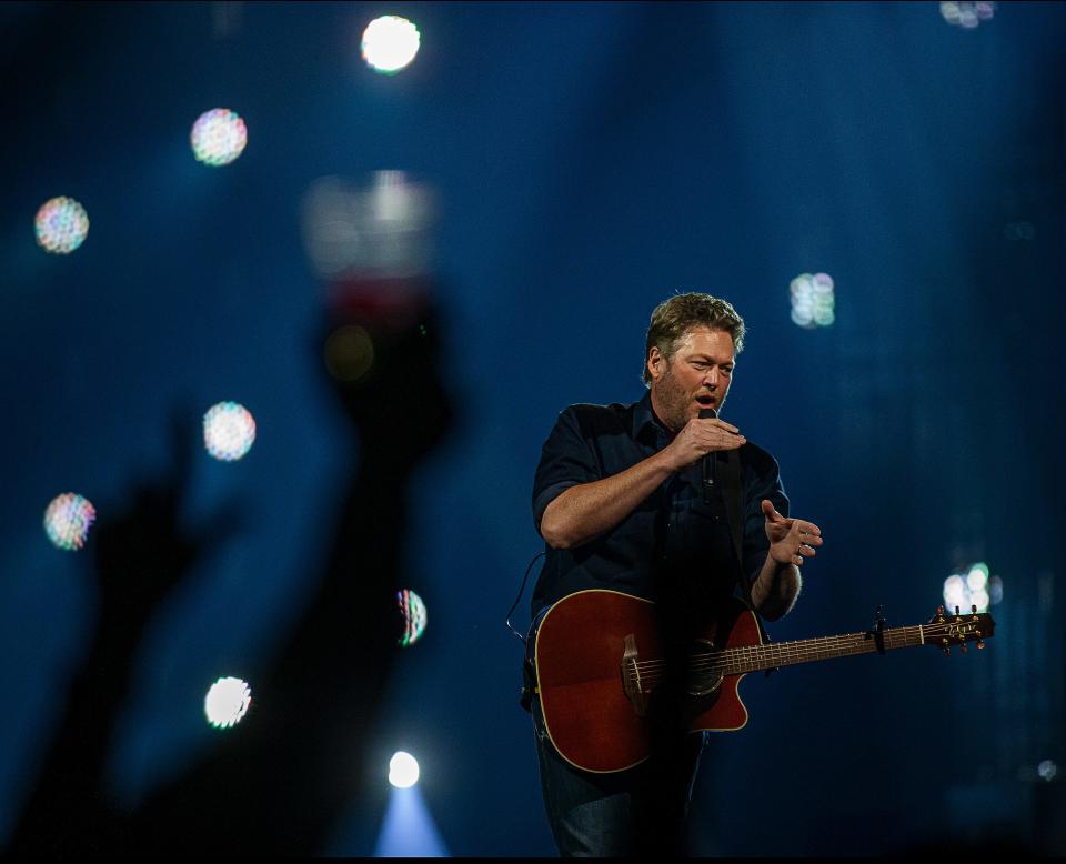 Fans at the stageside bar raised a glass as Blake Shelton brought his Back to the Honky Tonk tour hit the KFC Yum Center Thursday night in Louisville, Ky. Mar. 5, 2023