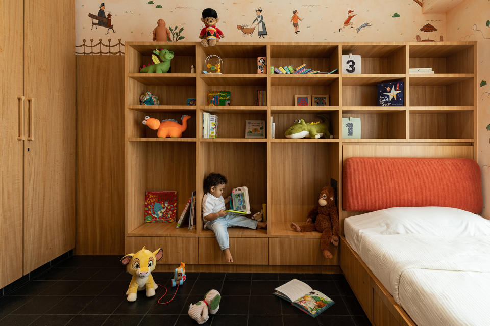 kid sitting in bedroom nook