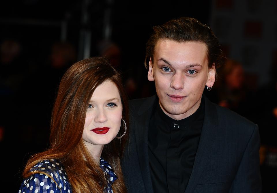 Bonnie Wright and Jamie Campbell Bower arriving for the 2012 Orange British Academy Film Awards at the Royal Opera House, Bow Street, London.