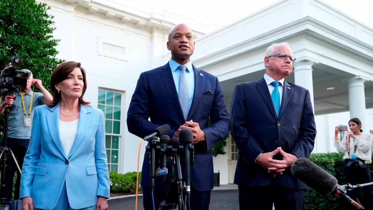 PHOTO: Maryland Gov. Wes Moore, center, standing with New York Gov. Kathy Hochul, left, and Minnesota Gov. Tim Walz, right, talk with reporters following their meeting with President Joe Biden at the White House in Washington, D.C., on July 3, 2024.  (Susan Walsh/AP)