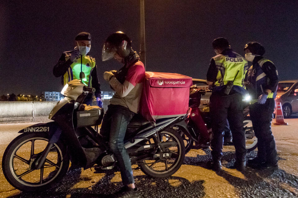 PHOTOS: Malaysian police enforce lockdown in Klang area