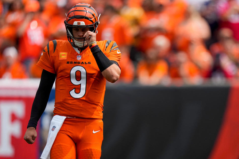 Sep 8, 2024; Cincinnati, Ohio, USA; Cincinnati Bengals quarterback Joe Burrow (9) circles behind the line between plays during the first quarter of the NFL Week 1 game between the Cincinnati Bengals and the New England Patriots at Paycor Stadium. Mandatory Credit: Sam Greene/USA TODAY Network via Imagn Images