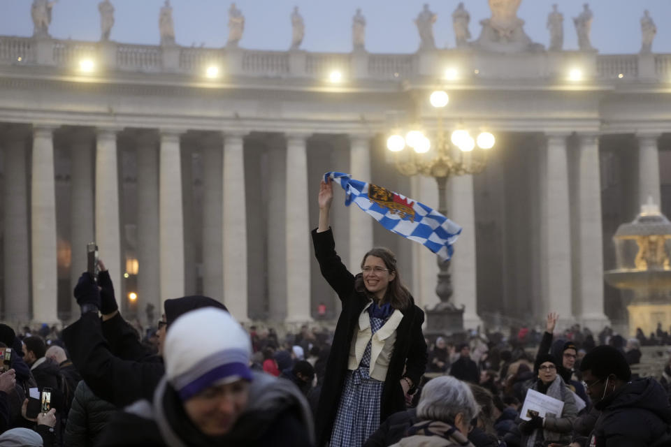 Faithful arrive into St. Peter's Square at the Vatican, ahead of the funeral mass for late Pope Emeritus Benedict XVI, Thursday, Jan. 5, 2023. Benedict died at 95 on Dec. 31 in the monastery on the Vatican grounds where he had spent nearly all of his decade in retirement, his days mainly devoted to prayer and reflection. (AP Photo/Gregorio Borgia)