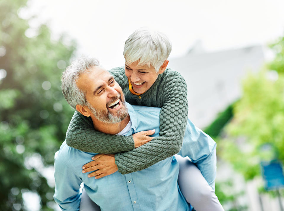 Older couple smiling (Getty Images)