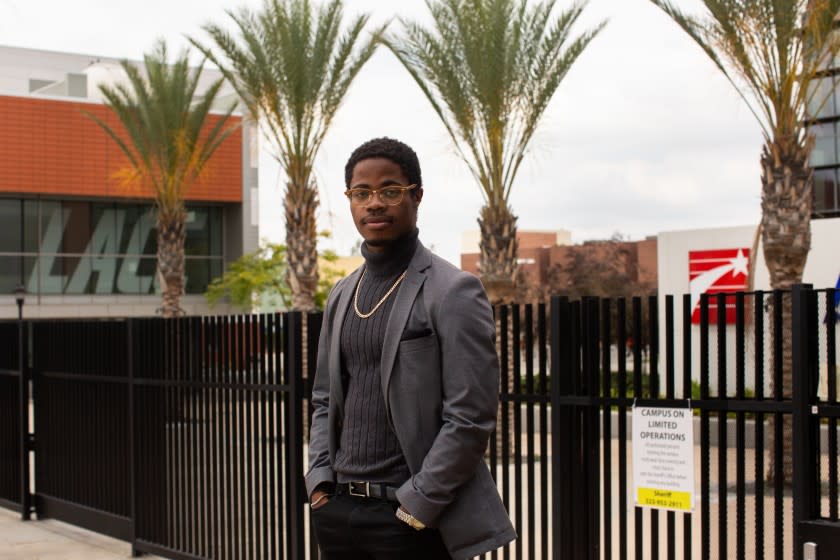 LOS ANGELES, CA - JUNE 17: Stevie Carpenter, a graduate of LA City College, poses for a campus at the closed campus of L.A. City College on Wednesday, June 17, 2020 in Los Angeles, CA. Carpenter just graduated and is planning to transfer to UC Davis this fall, but the switch online was difficult. He ended up having to withdraw from chemistry, which jeopardized his admission to UC Davis. (Gabriella Angotti-Jones / Los Angeles Times)