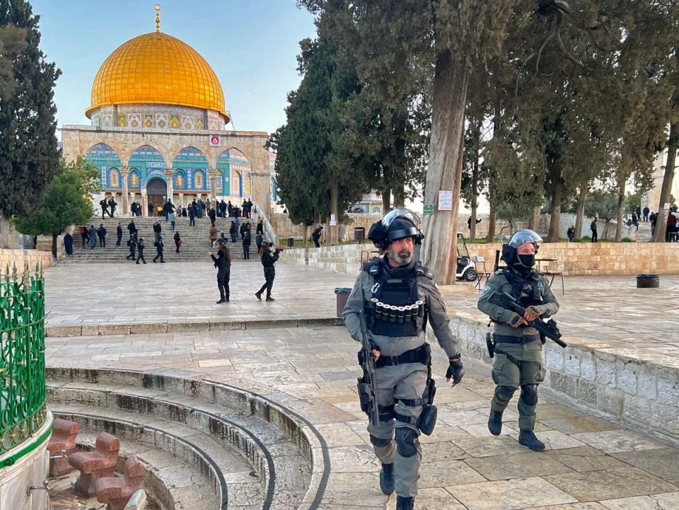 Israeli police walk inside the Al-Aqsa mosque compound on Wednesday (AFP via Getty Images)