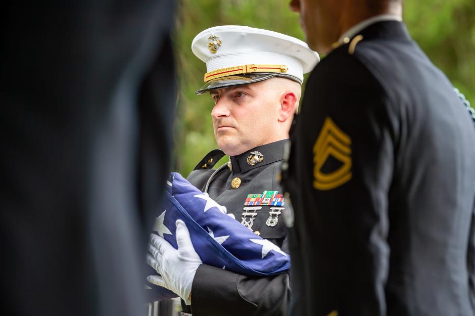 Marine Joseph Soileau , the great nephew of Pvt Soileau presents the flag to Mary Lee Badeaux, Pvt Soileau’s sister. . Military honor guard funeral for Pvt. Hillary Soileau at Cedar Hill Cemetery in Washington, LA. 79 years after being declared missing in action during a battle on Guadalcanal January 10, 1943. Saturday, May 21, 2022.