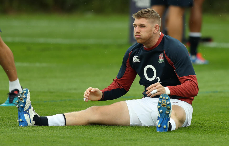 BRISTOL, ENGLAND - AUGUST 16:  Ruaridh McConnochie stretches during the England captain's run held at Clifton College on August 16, 2019 in Bristol, England. (Photo by David Rogers/Getty Images)