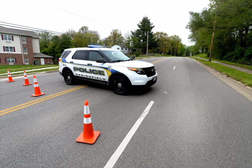 A Springfield Police squad car sits at the 2400 block Taylor Avenue after a Southeast High School teen was fatally shot across from Dreamland Park Wednesday April 24, 2024.