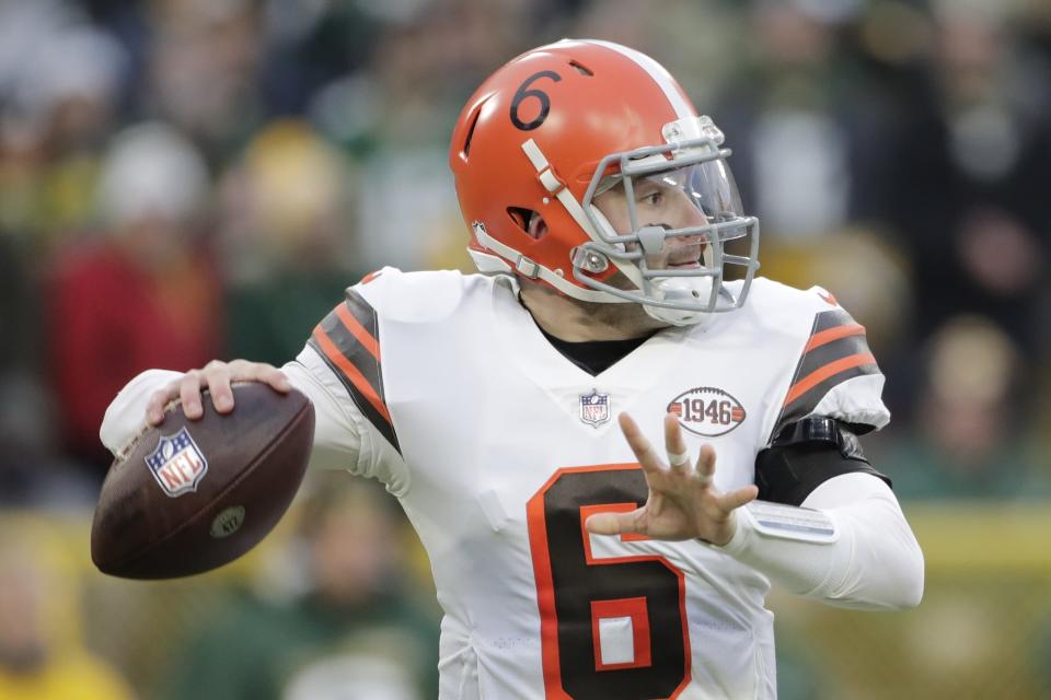 Cleveland Browns' Baker Mayfield throws during the first half of an NFL football game against the Green Bay Packers Saturday, Dec. 25, 2021, in Green Bay, Wis. (AP Photo/Aaron Gash)