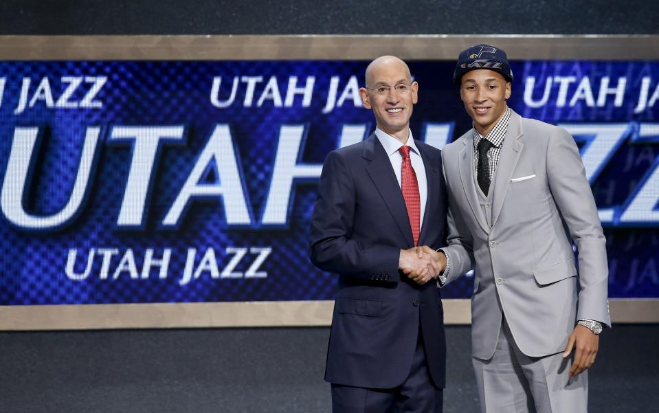 Dante Exum, right, poses for a photo with NBA commissioner Adam Silver after being selected by the Utah Jazz as the fifth overall pick during the 2014 NBA draft on June 26, 2014, in New York. | Kathy Willens, Associated Press