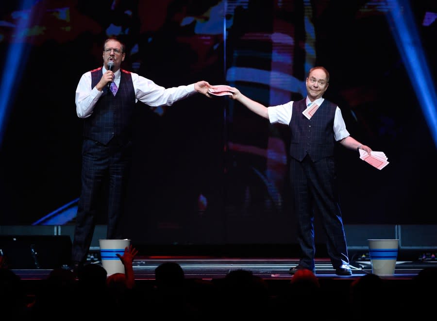 <em>LAS VEGAS, NV – DECEMBER 01: Penn Jillette (L) and Teller of the comedy/magic team Penn & Teller perform at the Vegas Strong Benefit Concert at T-Mobile Arena to support victims of the October 1 tragedy on the Las Vegas Strip on December 1, 2017 in Las Vegas, Nevada. (Photo by David Becker/Getty Images)</em>