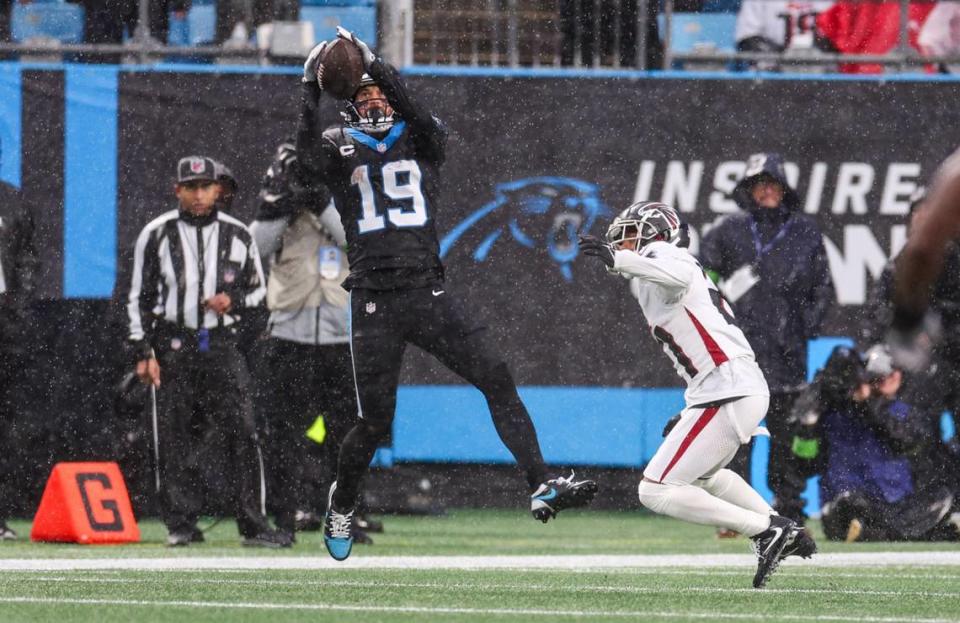 Panthers wide receiver Adam Thielen (19) catches a pass during the game against the Falcons at Bank of America Stadium on Sunday, December 16, 2023.