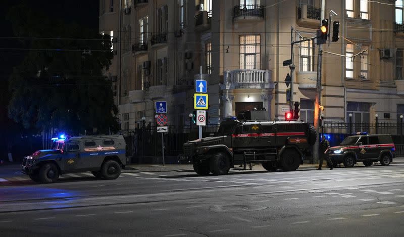 Armoured vehicles are seen on a street of the southern city of Rostov-on-Don