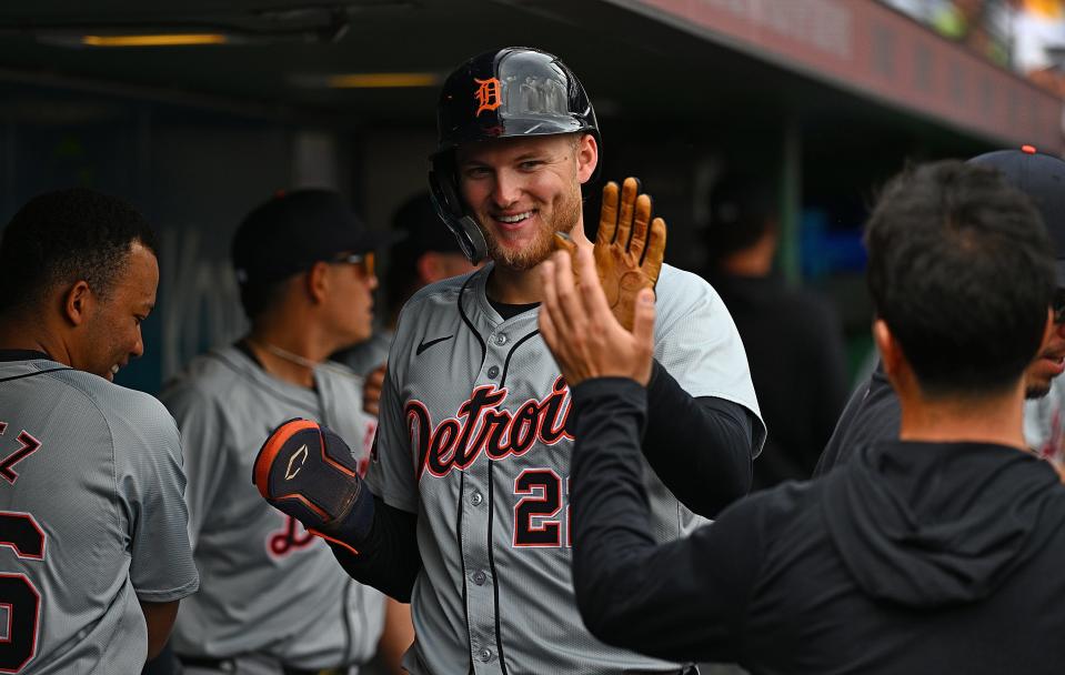 Detroit Tigers' Parker Meadows celebrates with teammates in the dugout after scoring in the ninth inning against the Pittsburgh Pirates at PNC Park on April 9, 2024 in Pittsburgh.