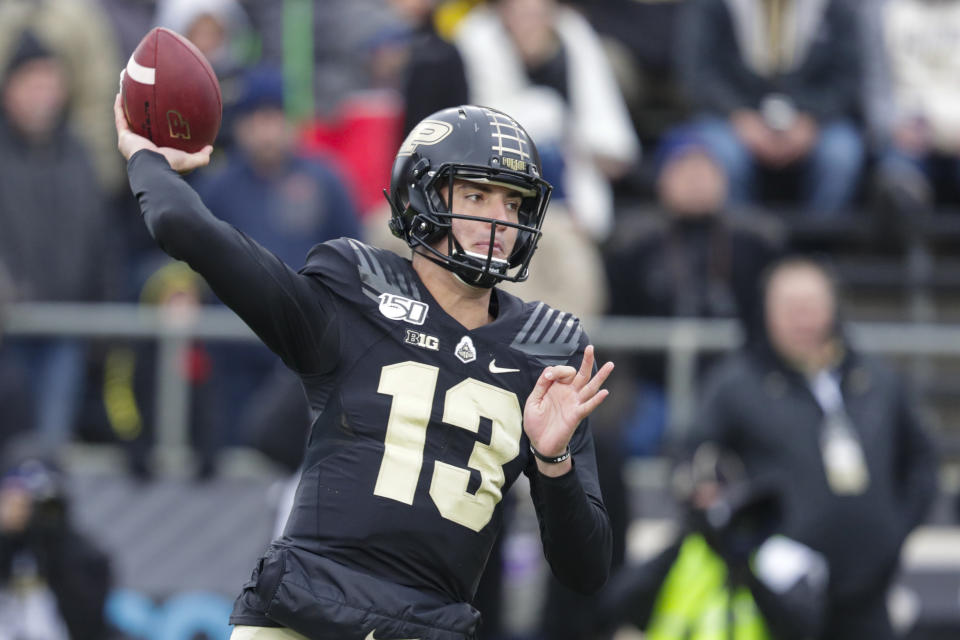 In this photo taken on Saturday, Nov. 2, 2019, Purdue quarterback Jack Plummer (13) throws against Nebraska during the first half of an NCAA college football game in West Lafayette, Ind. (AP Photo/Michael Conroy)