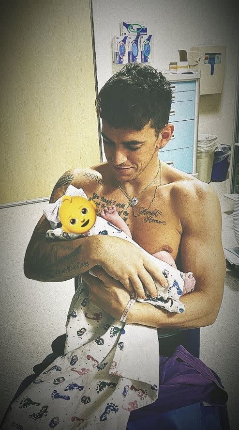 Fine also shared a photo of himself holding baby Frankie, covered with an emoji, in the hospital room to his Stories.