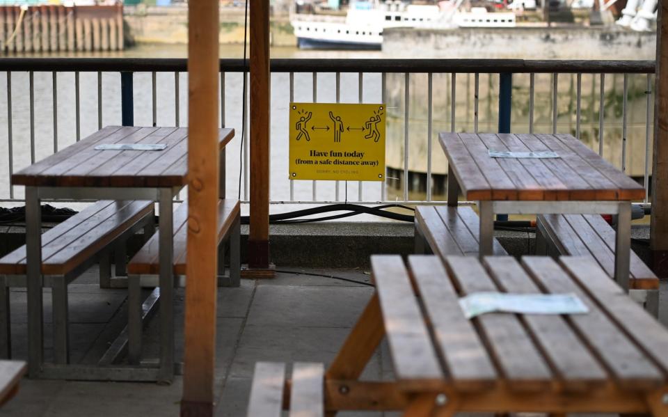 Mandatory Credit: Photo by ANDY RAIN/EPA-EFE/Shutterstock (12081126k)A social distancing sign at an outside restaurant in London, Britain, 15 June 2021. British Prime Minister Boris Johnson has announced on 14 June, a month long delay to lockdown easing regulations. The UK government is to delay for a further four weeks to full reopening due to a significant rise in Delta variant Covid-19 cases across England.Prime Minister Boris Johnson announces delay to lockdown easing, London, United Kingdom - 15 Jun 2021 - ANDY RAIN/EPA-EFE/Shutterstock